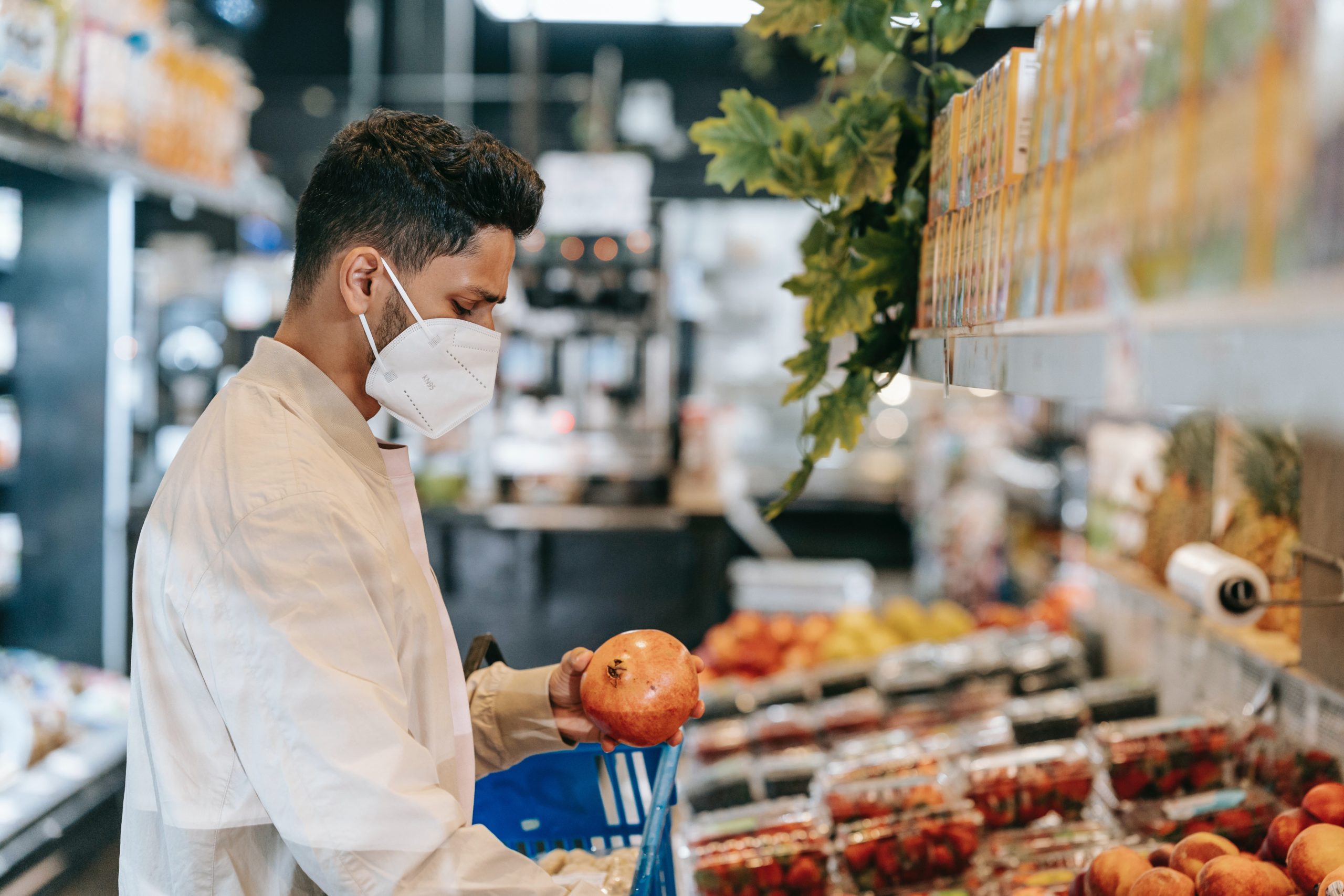 Man wearing a mask in a supermarket