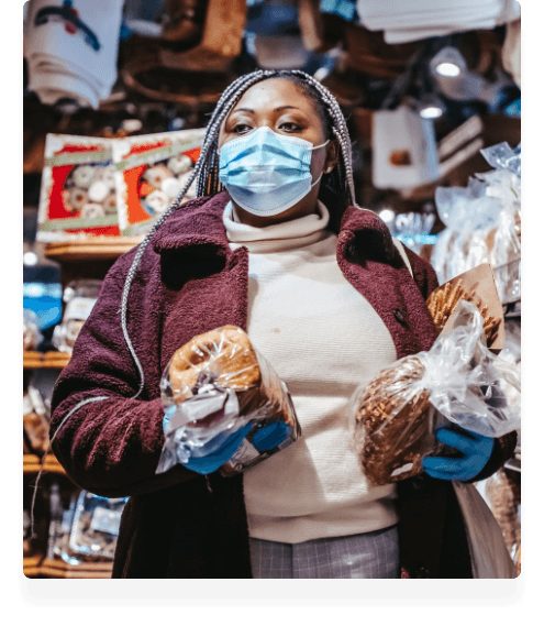 woman-with-facemask-and-groceries